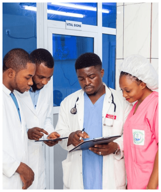 Doctors reviewing vitals
